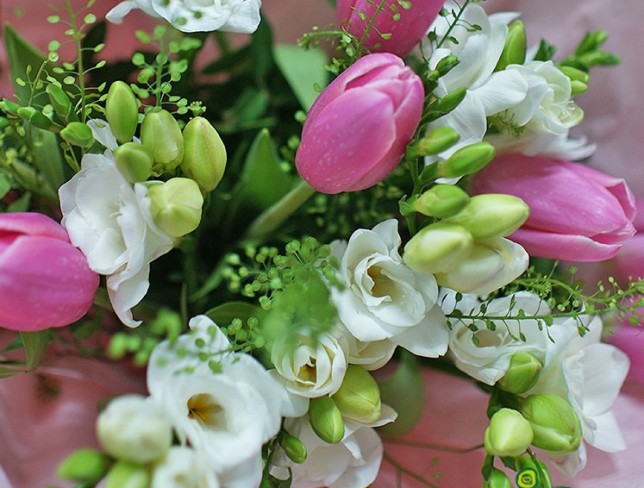 Bouquet with white freesias and pink tulips photo